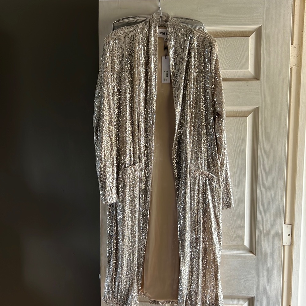 Silver sparkly duster NWT . Steve Madden